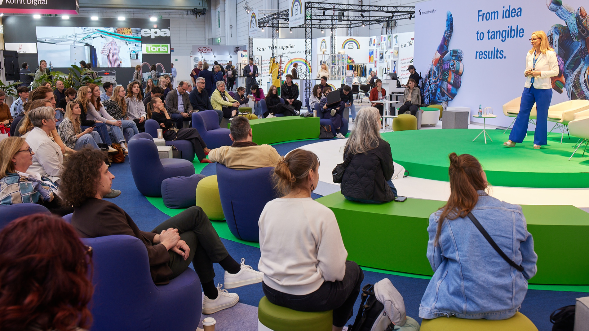 Audience members attend a talk at the Texprocess Forum
